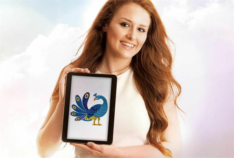 image of a woman holding a design made with the Brother BES 4 Dream Edition Wireless Upgrade Software